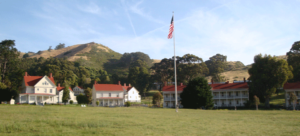 Parade Ground of Fort Baker, HD San Francisco 2011. Left to right on the parade ground are the commanding officers quarters, the administration building, and a barracks, with three NCO quarters visable behind.